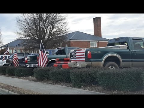 Students show up displaying American flags on vehicles after administrator said to remove them