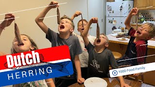 American Kids Try Dutch New Herring | Food 165 of 1000