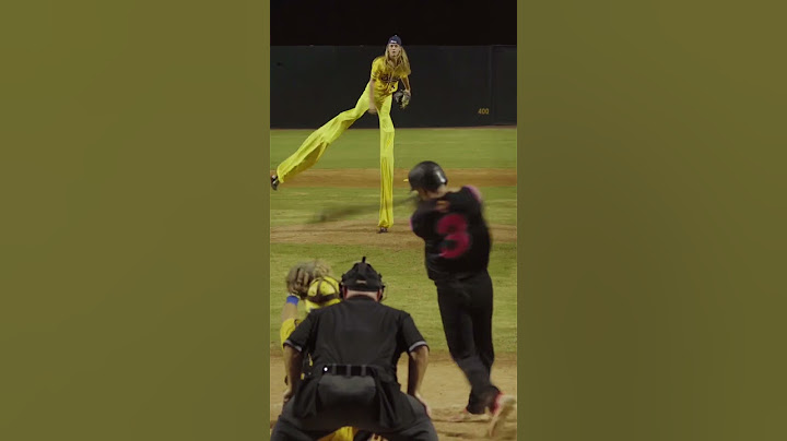 Ball goes through pitcher on stilts legs