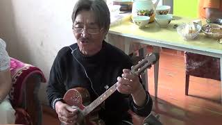 TUVA—Andrei Öpei plays chanzy and sings, with interview notes.