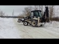 Экскаватор погрузчик Hidromek чистит снег в Белгороде на spetskran40.ru