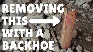 Removing a Concrete Ballard Post with a Backhoe