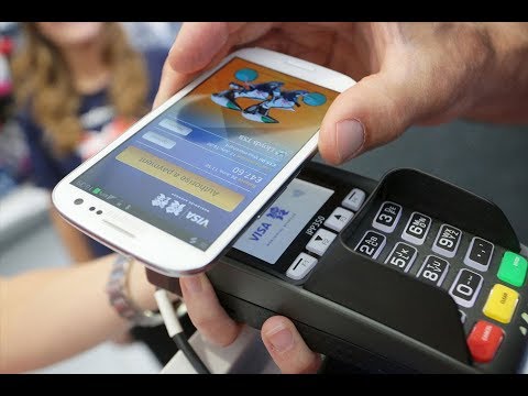 Vídeo: Como Pagar Com Telefone Em Uma Loja