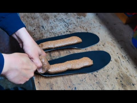 The process of making special handmade hiking boots. 100 years of history hiking boots workshop