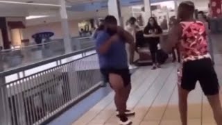 Women beats up BIG man in a Street fight