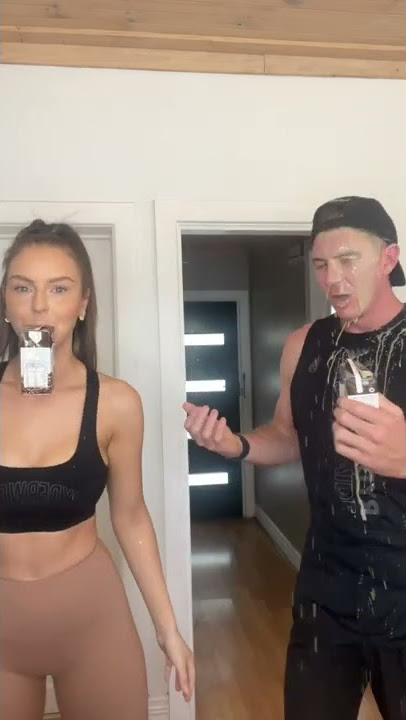 Girl pranks boyfriend by squirting drink in his face!