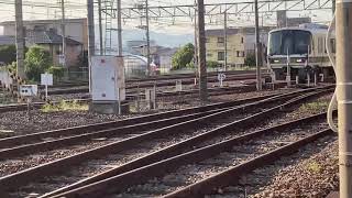 向日町駅付近221系発車