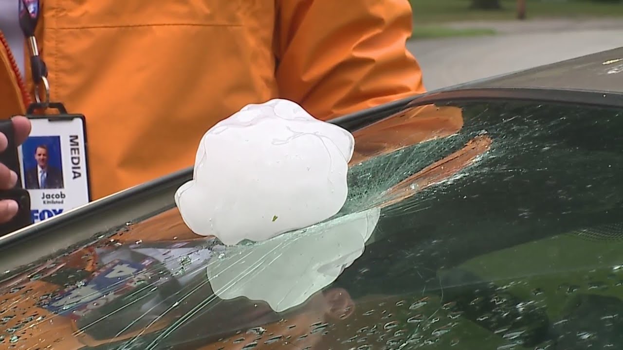 Cass County homeowners survey damage from softball-size hail - YouTube