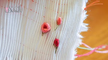 Sewing bullion roses on top of smocking pleats