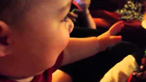 Roman and Leilani being cute on the couch