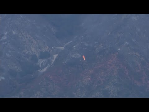 Raw: Storms Slow Los Angeles County Wildfire