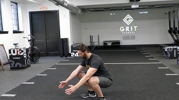 Deep Squat with Overhead Reach