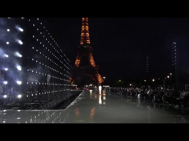 Yves Saint Laurent sends silky evening gowns down Eiffel Tower runway