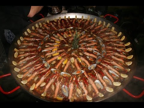 Video: Paella Met Inkvis, Garnale En Mossels