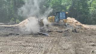 D5 raking and cleaning up burn pit. by Johnny Waters 220 views 4 years ago 48 seconds