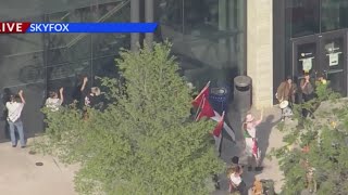 Protesters march at Auraria Campus as lockdown continues