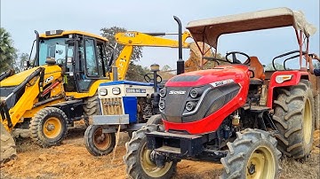 Jcb 3dx Eco Excellence Backhoe Machine Loading Red Mud In Mahindra 4WD Tractor and Swaraj Tractor
