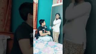 Sister threatens brother to drink milk