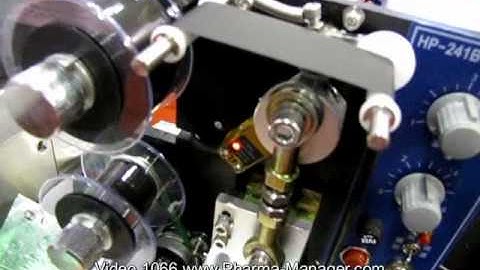 Printer for printing expiration date & batch number on packaging. Video 1066 www.Pharma-Manager.com