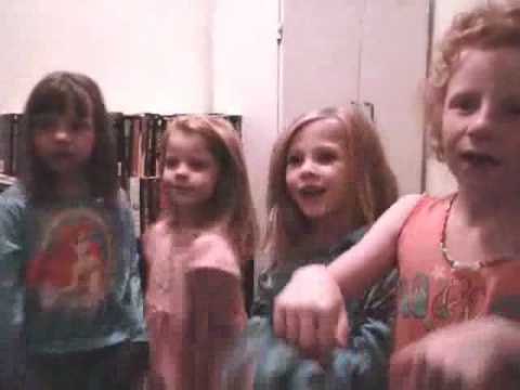 Emilie and her sister and their two cousins singin...