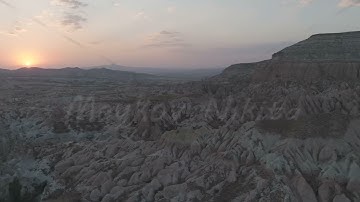 D-Log M. Goreme, Nevsehir, Turkey. Beautiful sunset over Red Valley in Cappadocia with vibrant re...