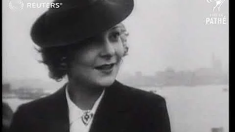 Helen Vinson is met by Fred Perry at New York dock...