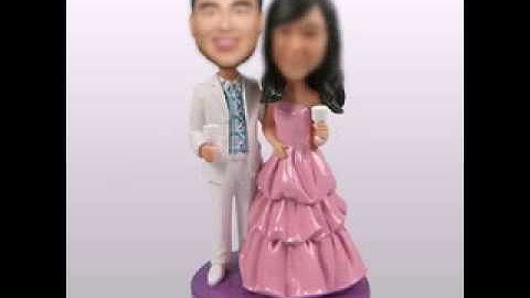 Make your own bobblehead in bobble365.com!Associated with it - custom wedding cake toppers
