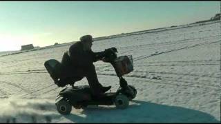 70MPH Mobility Scooter in the SNOW(This is my WORLD RECORD HOLDING Fastest mobility scooter being thrashed in the snow which as you can see was BLOODY WICKED. I reached around ..., 2012-02-05T20:00:59.000Z)