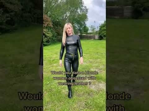 blonde walking in leather catsuit