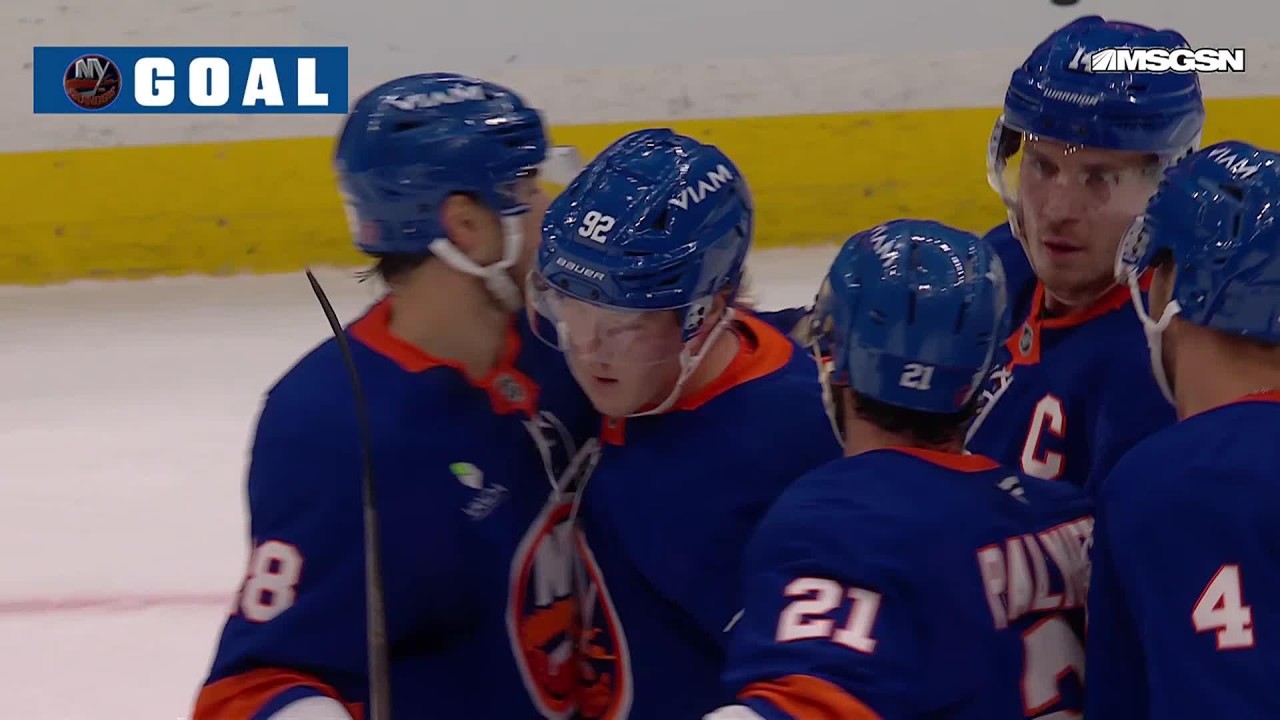 Simon Holmstrom scores a goal against the New Jersey Devils
