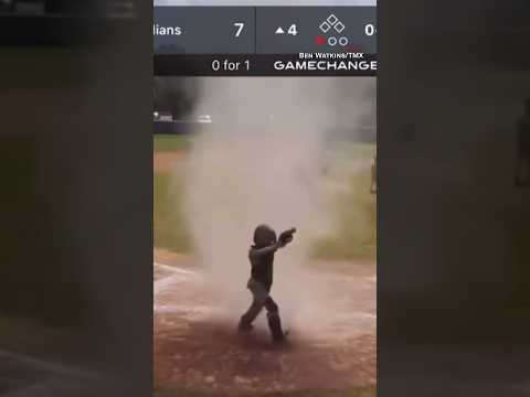 Child caught in dust devil during baseball game