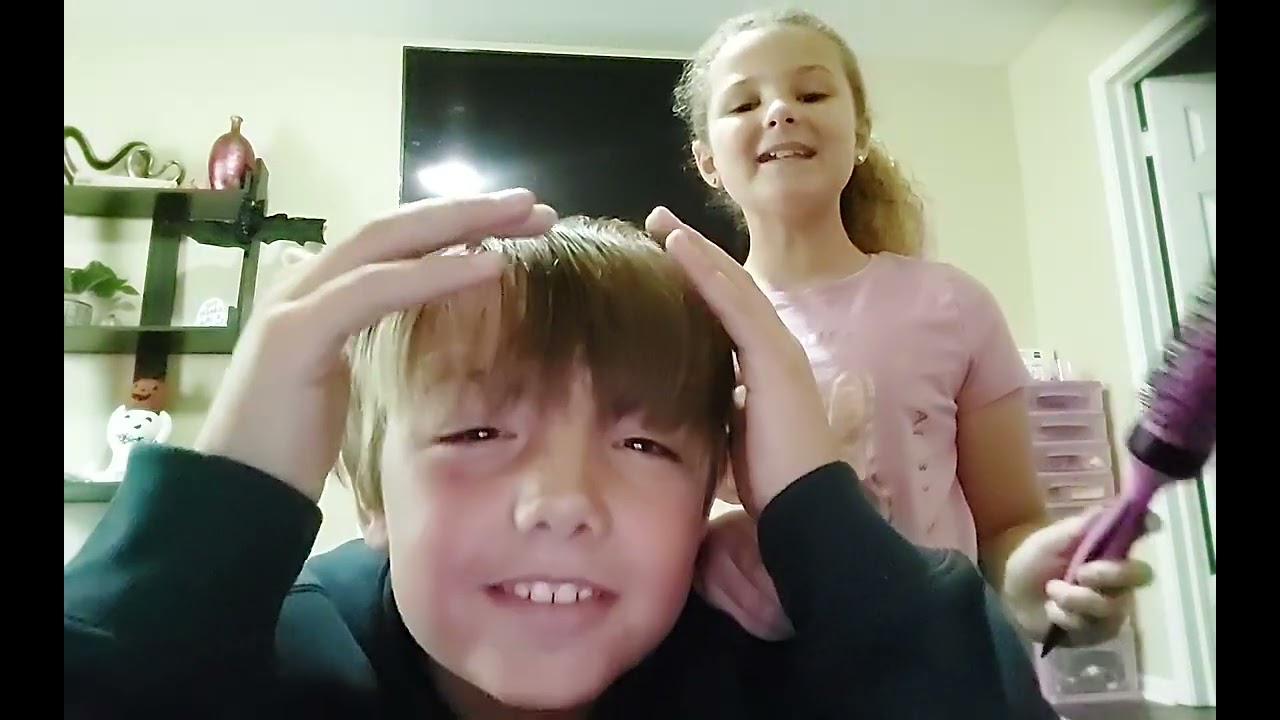 Cousin doing my hair again...