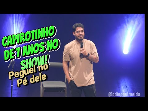 Capirotinho de 7 anos do show! Peguei no pé dele!