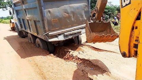 Tipper truck video | Tata tipper truck stuck in mud , Rescue by Jcb3dx backhoe Dozer