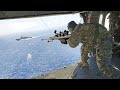 Skilled US Marines Door Gunner Shoots Targets From Moving Helicopter at Sea