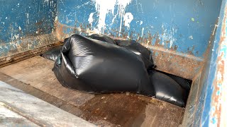 Small Compactor and black Bags (Full HD)