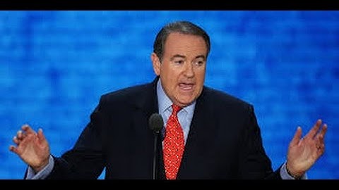 Mike Huckabee live tweets DemDebate, says something racist.