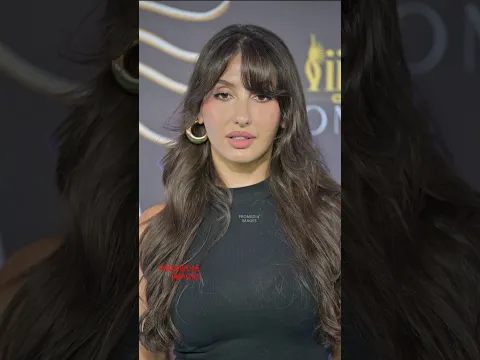 1/2 Nora Fatehi looked perfect chic in Black Crop Top, Baggy Denims & sleek heels for IIFA Connex