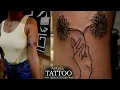Tattoo for Born in the Month of November Chrysanthemum Flower and a hand tattoo