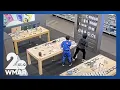 Two arrests made in the shooting death of T-Mobile store worker