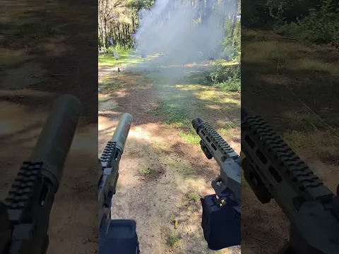 Belt fed 9mm akimbo