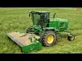JOHN DEERE W260 Windrower Mowing Hay