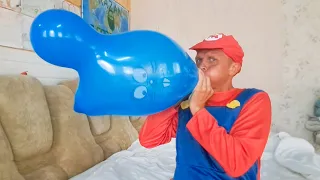 Mario inflates colorful animal balloons and they burst.