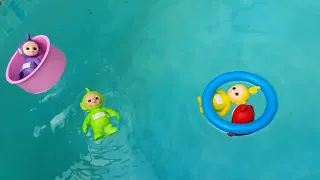 Playing with baby doll at swimming pool