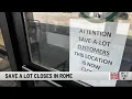 Sign Points to Save A Lot Grocery Store Closure in Rome