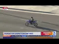 LAPD officers chase suspect fleeing on dirt bike