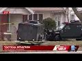 Milwaukee police tactical units surround home