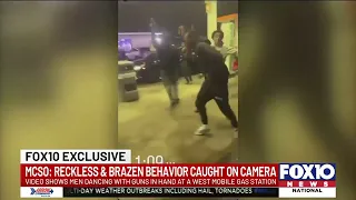 Shocking shows young men dancing with guns in west Mobile gas station parking lot