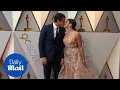 Sealed with a kiss Gina Rodriguez Joe LoCicero at Oscars 2018 - Daily Mail