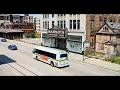 DDOT RTS DRIVING BY MAMMOTH DEPARTMENT STORE BORDED UP BUILDINGS DETROIT CITY